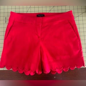 Red shorts with scalloped edges